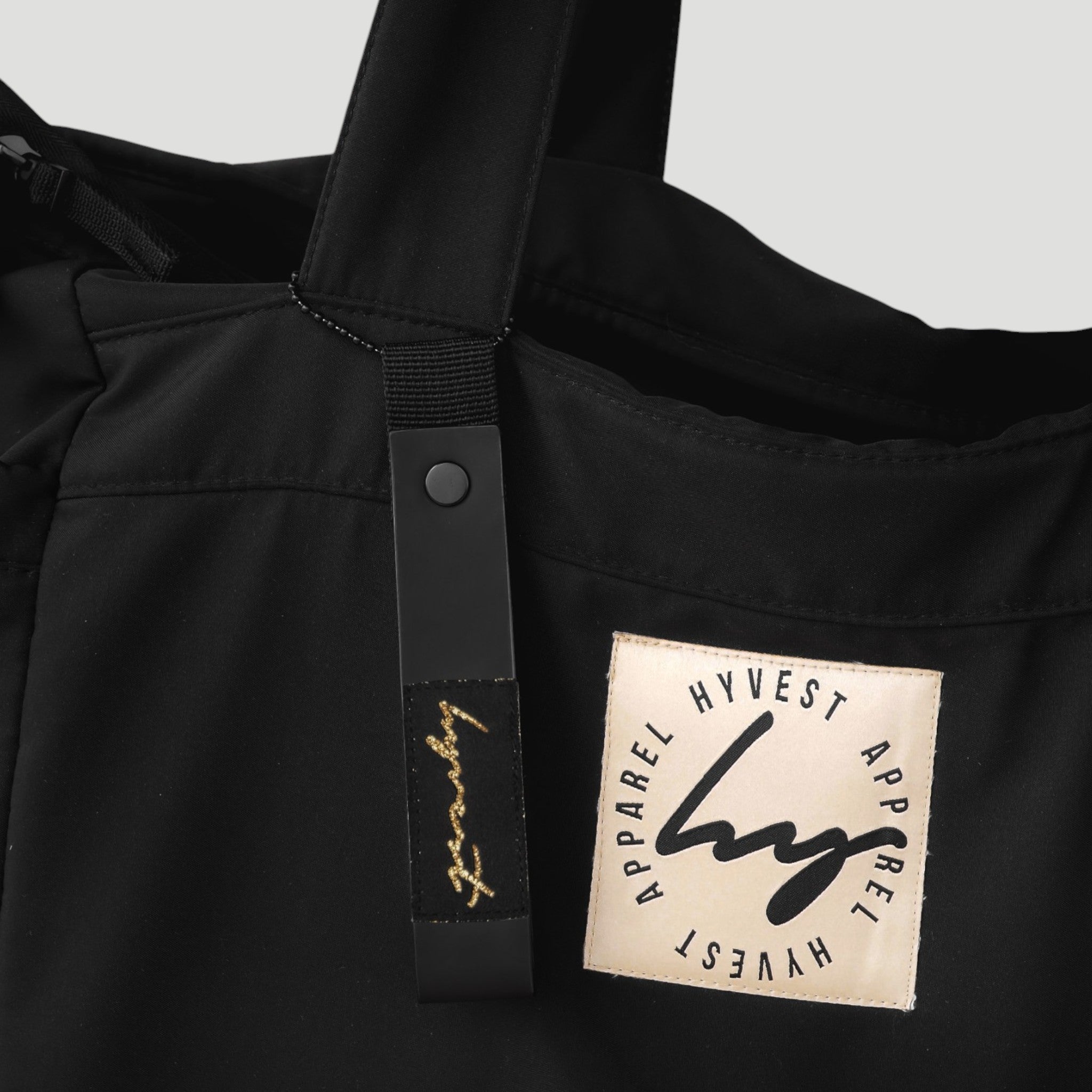 HYVEST Schlüsselanhänger schwarz gold als Taschenanhänger